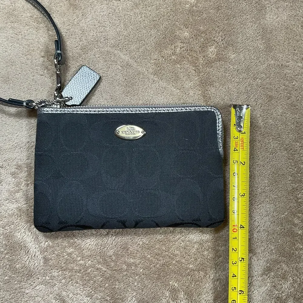 Coach black signature